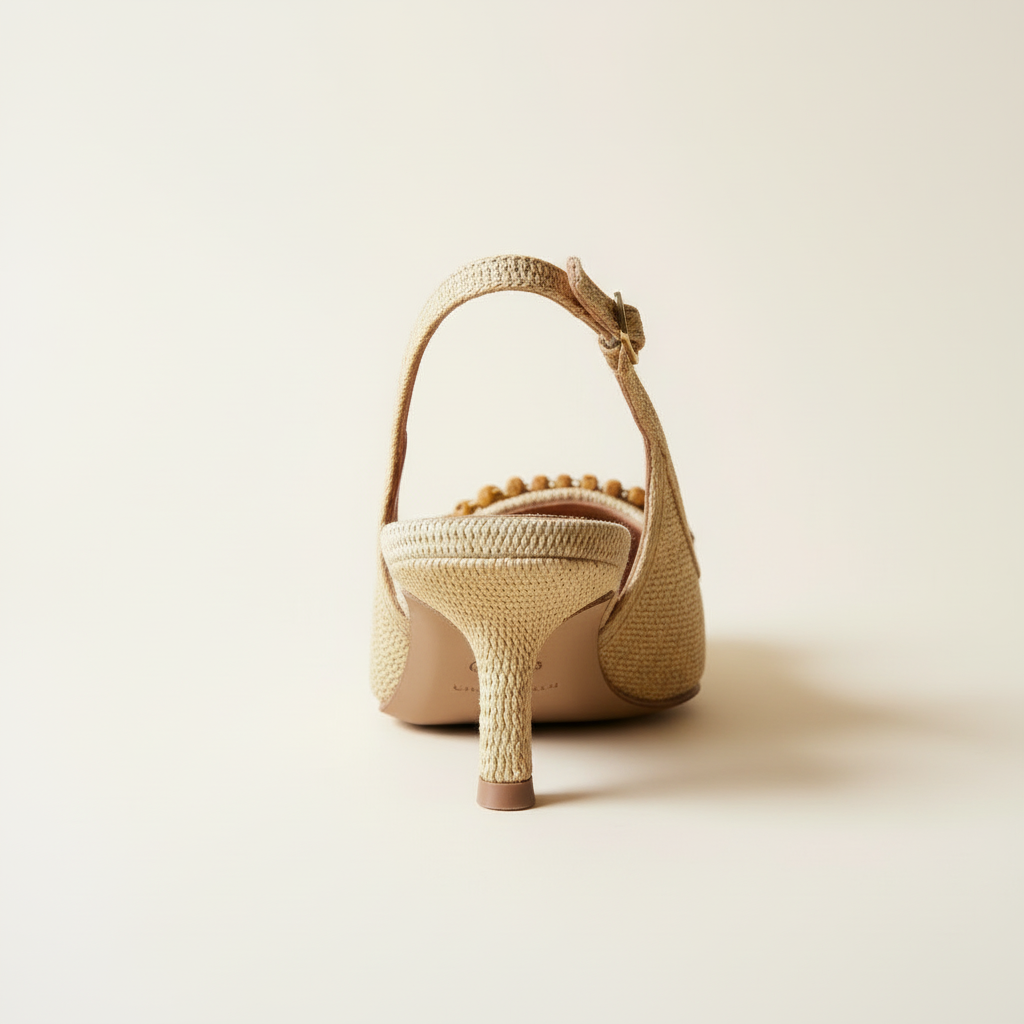 Woven high-heeled shoe on a light beige background