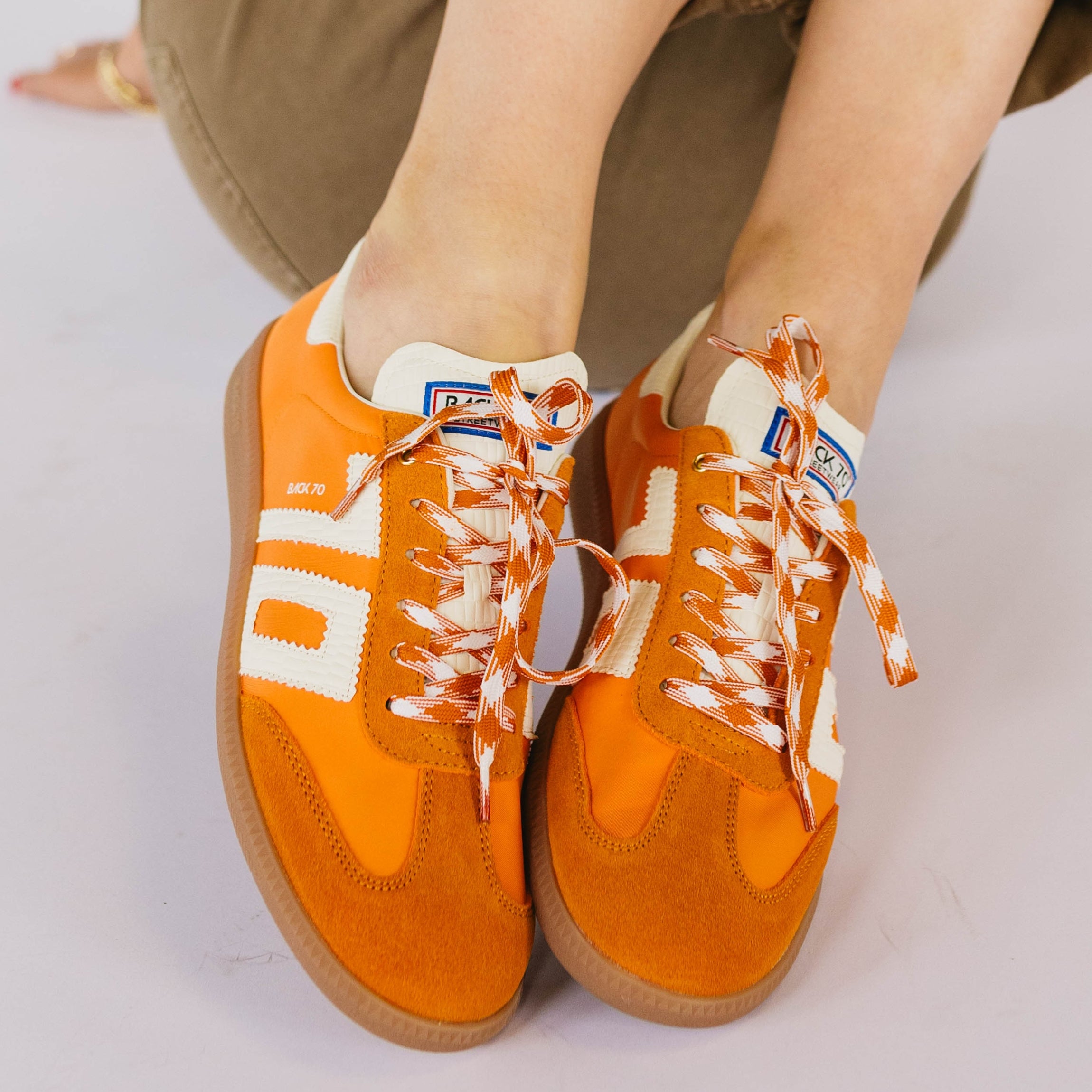back 70 ghost orange sneaker closeup