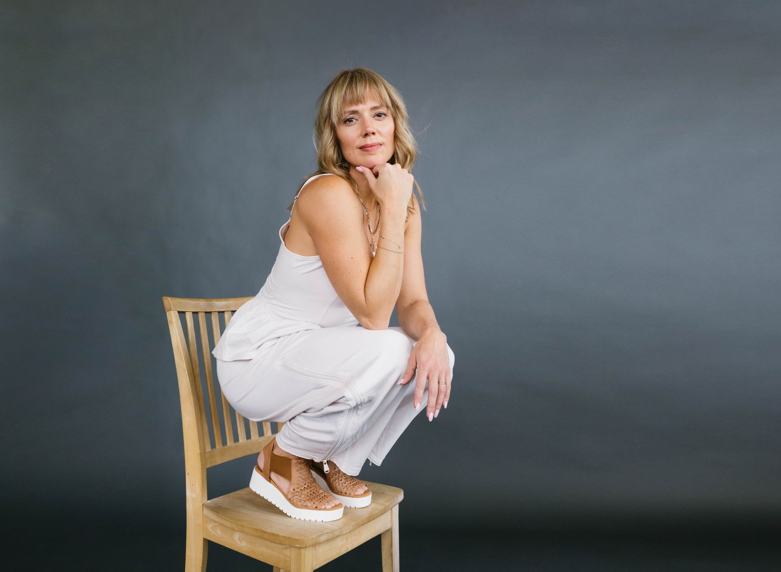 Curated sandals, sneakers, wedges, flats, and walking shoes with real comfort features—arch support, soft leathers, cushioned footbeds, and all-day wearability.